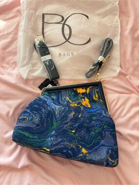 BCBG Blue Marble Print Frame Clutch with Yellow & Green Accents